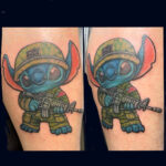 custom color tattoo of Stitch from Lilo and Stitch in army fatigues done by artist https://www.instagram.com/james.paul.egan?igsh=MWdiMHQ3NHkzMWkxdA%3D%3D&utm_source=qr@james.paul.egan in the Newport, Lincoln City, South Beach, Depoe Bay, Toledo, Gleneden Beach, Lincoln Beach, Chinook Winds Casino, Waldport, Florence Oregon Coast area and Region