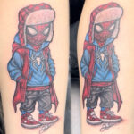 Color custom design tattoo of The Amazing Spider Man in a trench coat and a hunter trap hat by the artist https://www.instagram.com/james.paul.egan?igsh=MWdiMHQ3NHkzMWkxdA%3D%3D&utm_source=qr